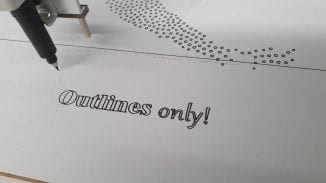 "outlines only" text drawn by the axidraw